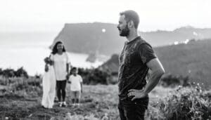 A modern, righteous, and dangerous wise Christian man wearing jeans and a t-shirt