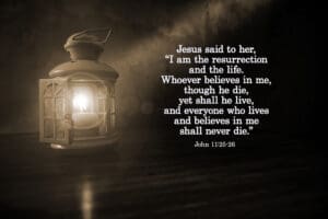Bible verse quote - Jesus said to her, I am the resurrection and the life. John The one who believes in me will live, even though they die. 11:25-26 With lantern light in the night in sepia background